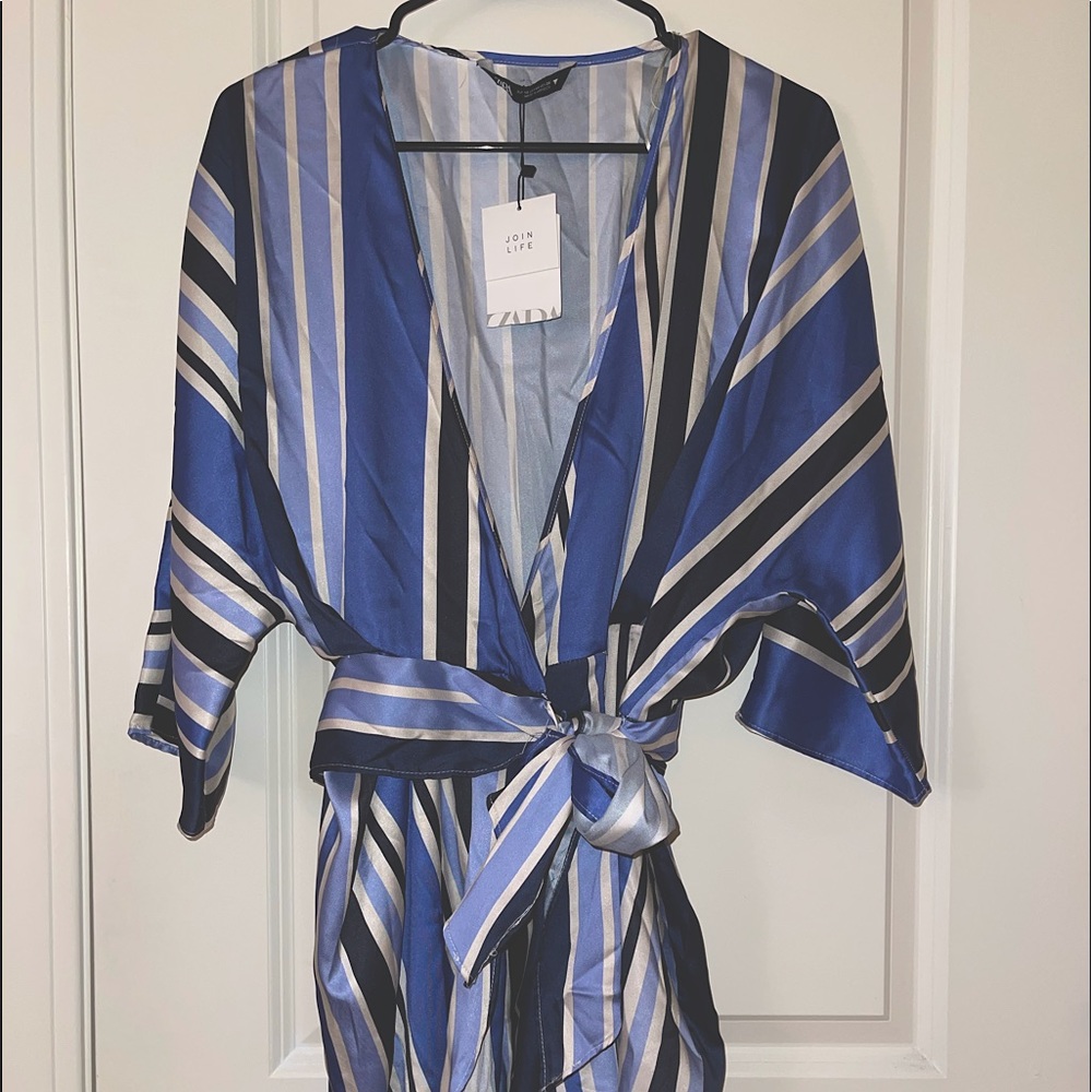 Beautiful, sea blue toned, satin romper like robe, with tie rope belt.